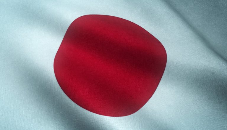 closeup-shot-waving-flag-japan-with-interesting-textures_181624-11285